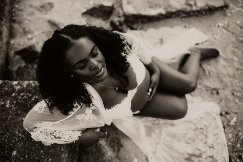 intimate black and white pregnancy portraits taken at a st Pete Beach 