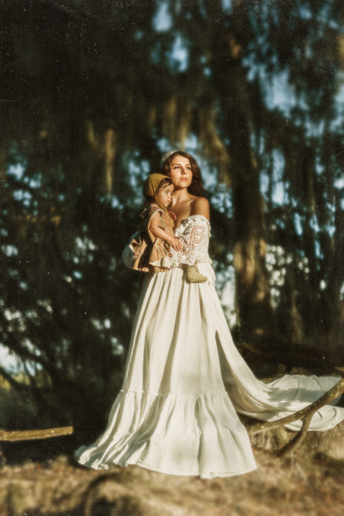 high end ethereal dreamy boho mother and daughter photo session in direct sunlight 