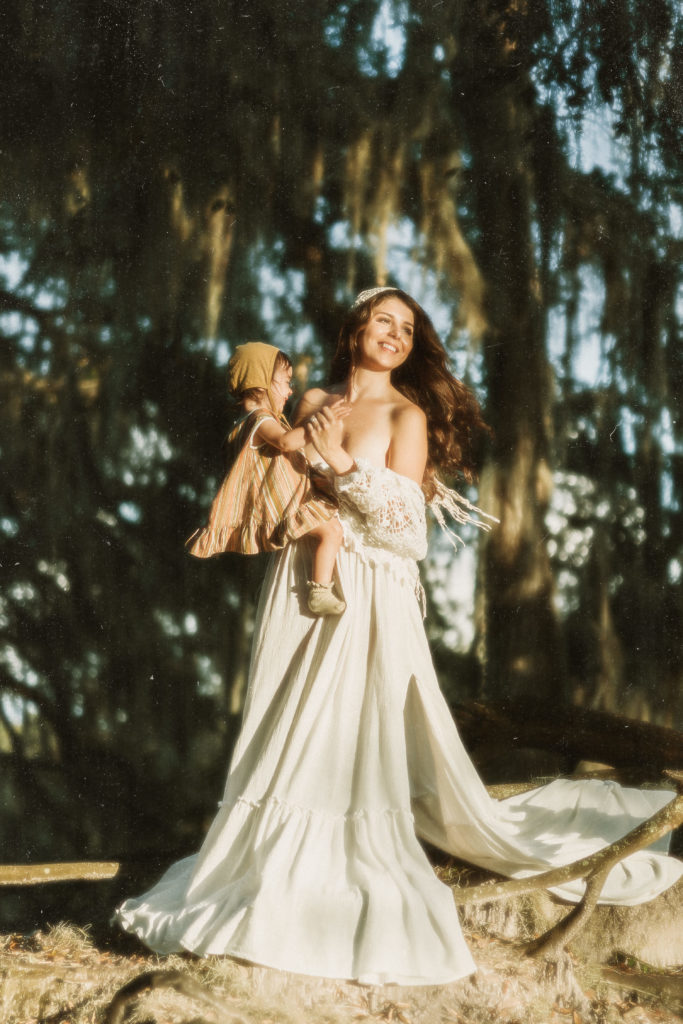 retro inspired mother and daughter photo session with vintage clothing taken at a park in tampa fl 