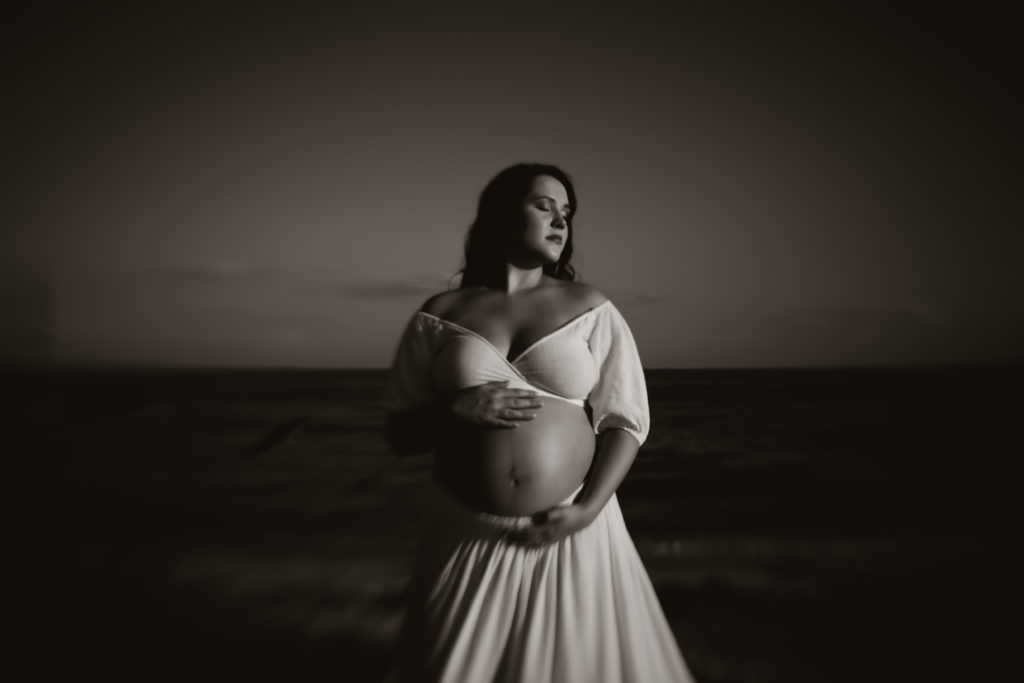 Moody black & white boho maternity portraits at the beach