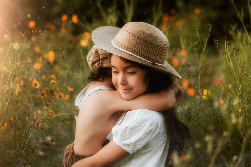 sibling photo session in a flower field